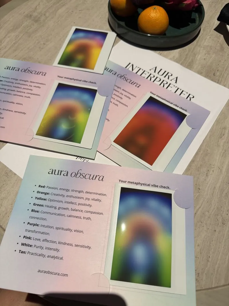 aura obscura keepsake cards next to the printed aura interpreter guide